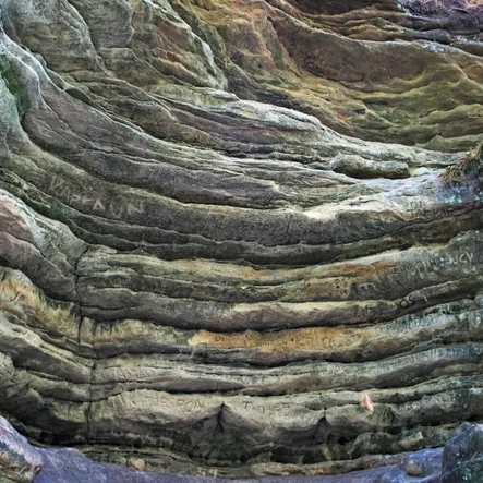 Graffiti on Eroded Sandstone Cliff, Matthiessen State Park Illinois