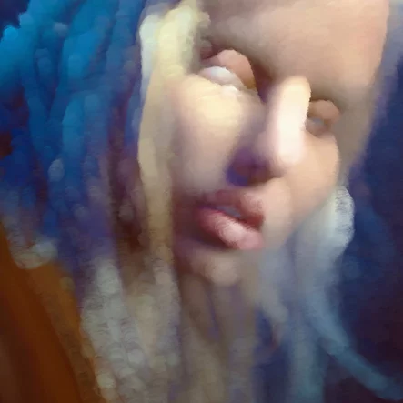 Portrait of a Blonde Haired Woman in Blue Light